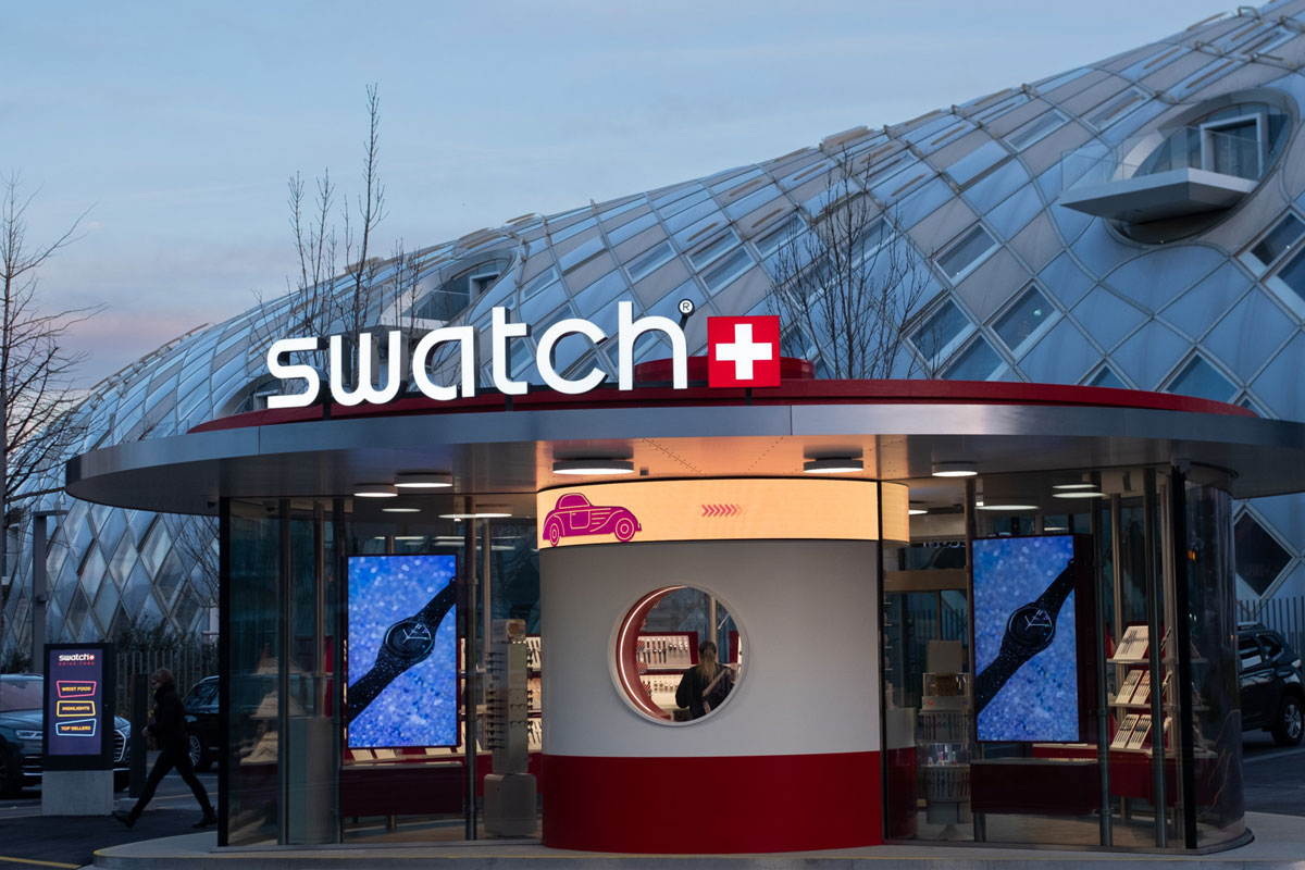 Swatch斯沃琪品牌LOGO设计案例-十字架元素标志设计