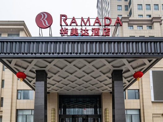 华美达酒店logo设计含义及酒店品牌设计理念