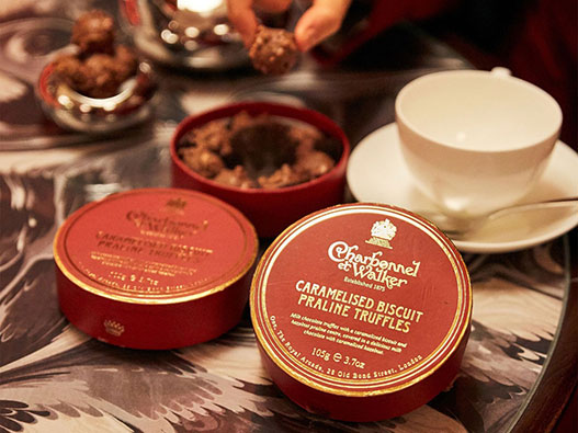 Charbonnel et Walker巧克力logo设计含义解读及英国品牌标志设计理念