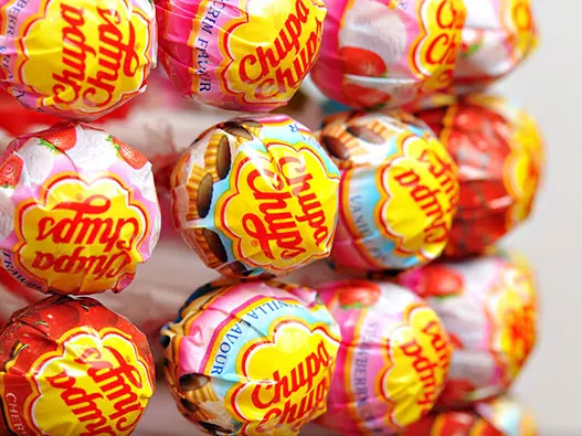 Chupa Chups西班牙珍宝珠棒棒糖标志设计含义、品牌历史及Logo演变赏析