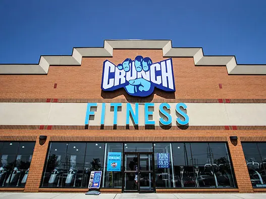 Crunch Fitness健身连锁店logo设计含义及健身房品牌标志设计理念